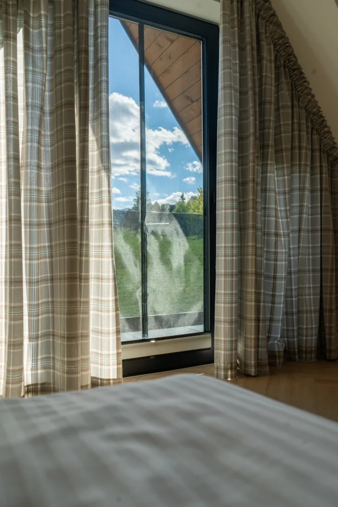 Glazed doors leading out of the bedroom